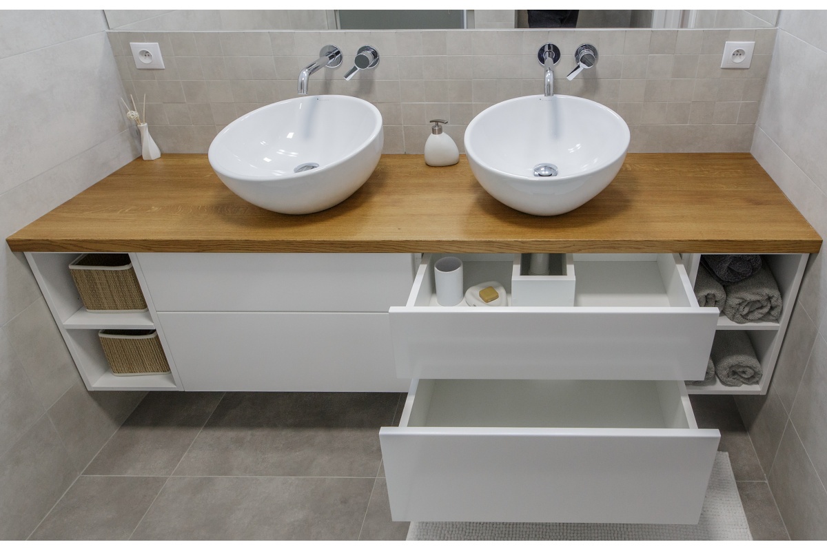 Family house interior - We built white sprayed cabinets for the bathroom of the two little princesses.