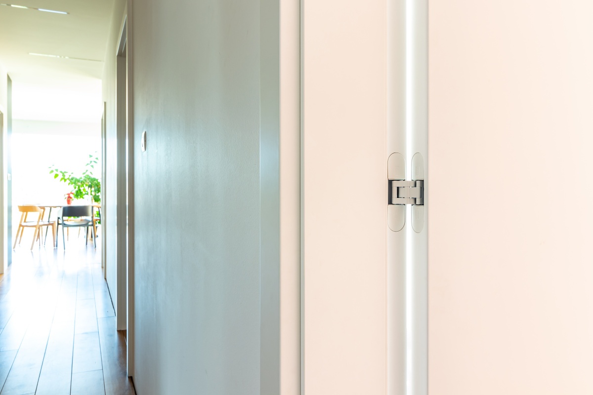 Family House  - We laid a solid oak oiled floor throughout the house; and we also added rabbetless white doors. 