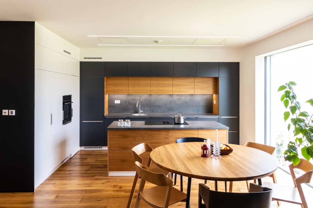 Family House  - We designed the round oak dining table for the open-plan dining room.